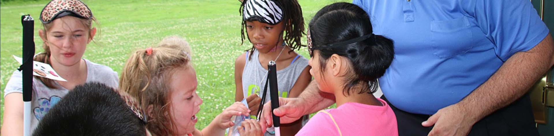 NFB BELL kids smile as they make homemade ice cream